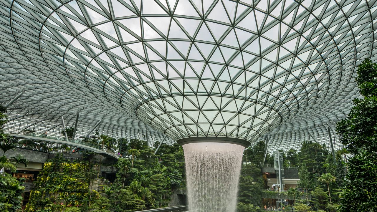 Terraced indoor gardens beneath the glass roof of Jewel at Changi Airport